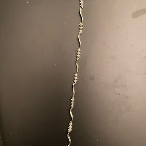 Elegant Silver Bracelet with Floral Accents